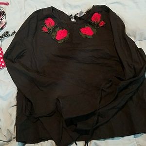 Black cotton top embellished with red roses.